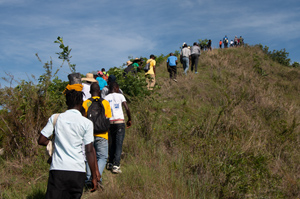 People walking up a hill