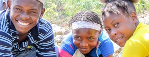 Children in Haiti learning to plant